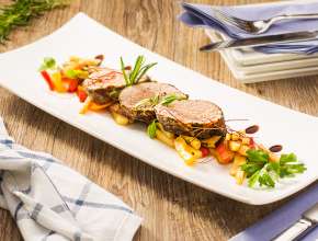Schweinsfilet im Kräutermantel