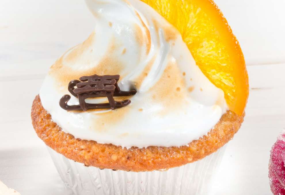 Orangencupcake mit Schneehaube