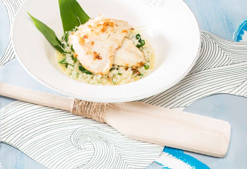 Gebratener Barramundi auf Spinat-Risotto