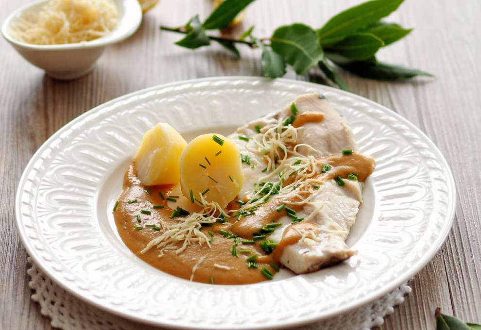 Gedämpftes Fischfilet mit Kren-Brotsauce